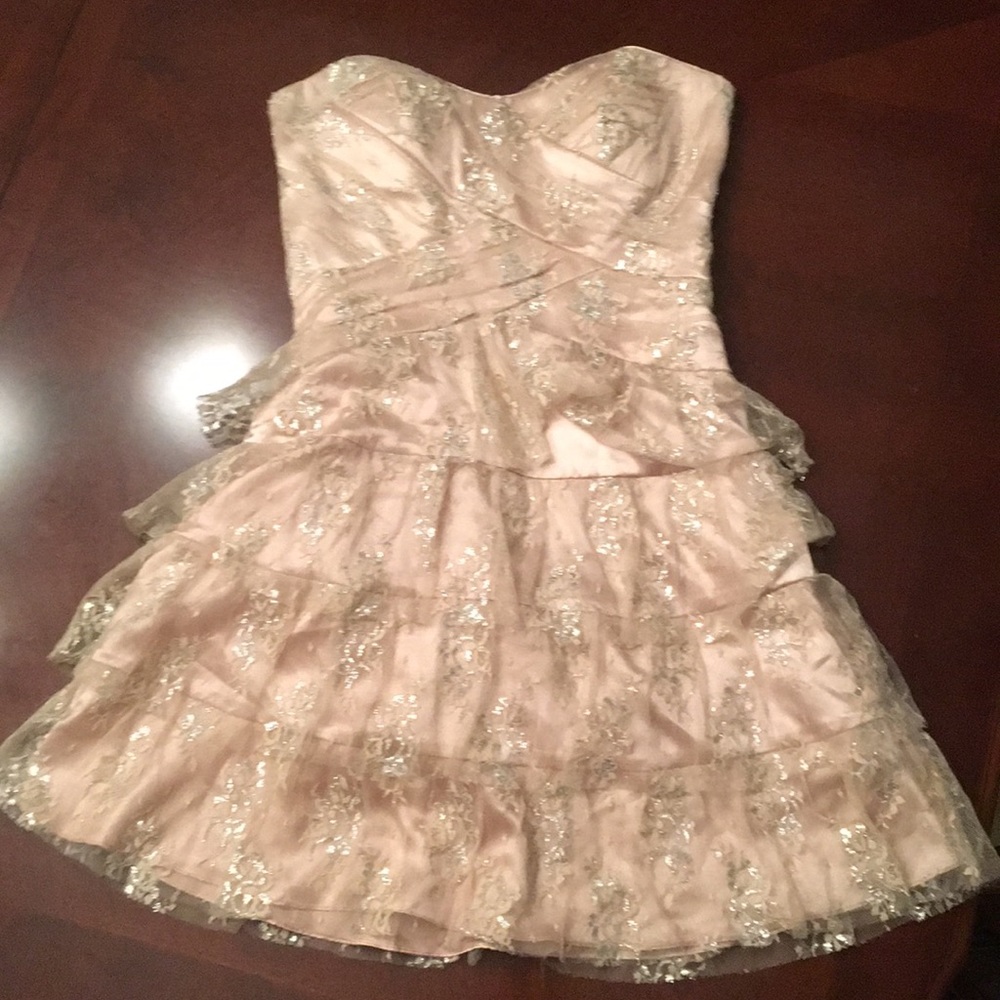 Cream/silver sparkly ruffle dress. Size 3/4.